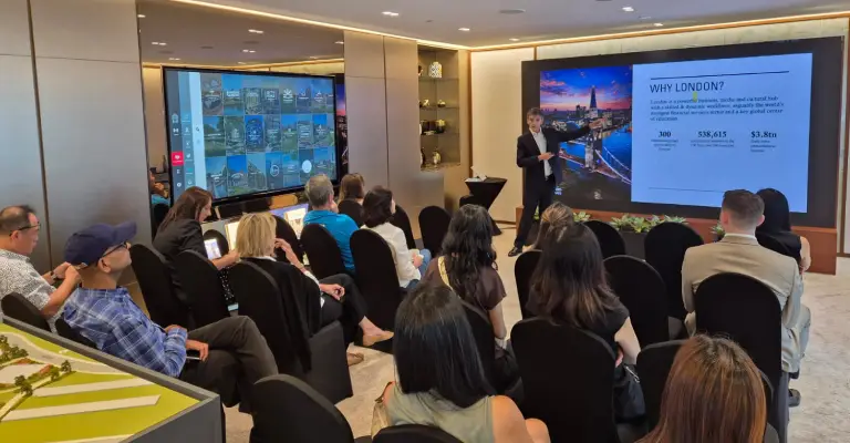 Marc presenting "Why London?" at the London property event at Benham and Reeves Singapore, highlighting key city investments.