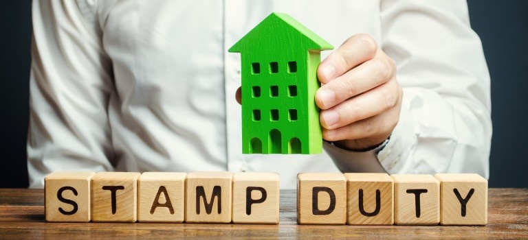 Currency exchange and stamp duty